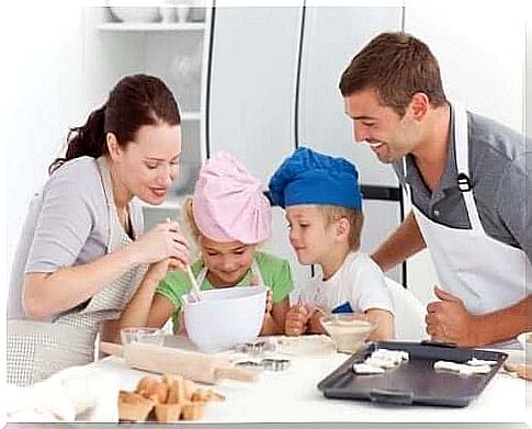 A family bakes cookies in the kitchen