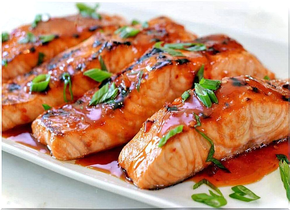 Salmon slices on a white plate