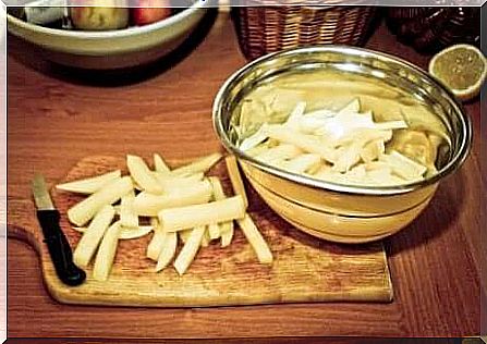 Homemade fries in a metal bowl