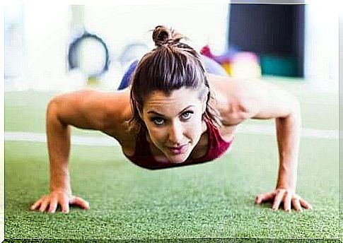 A woman does the plank